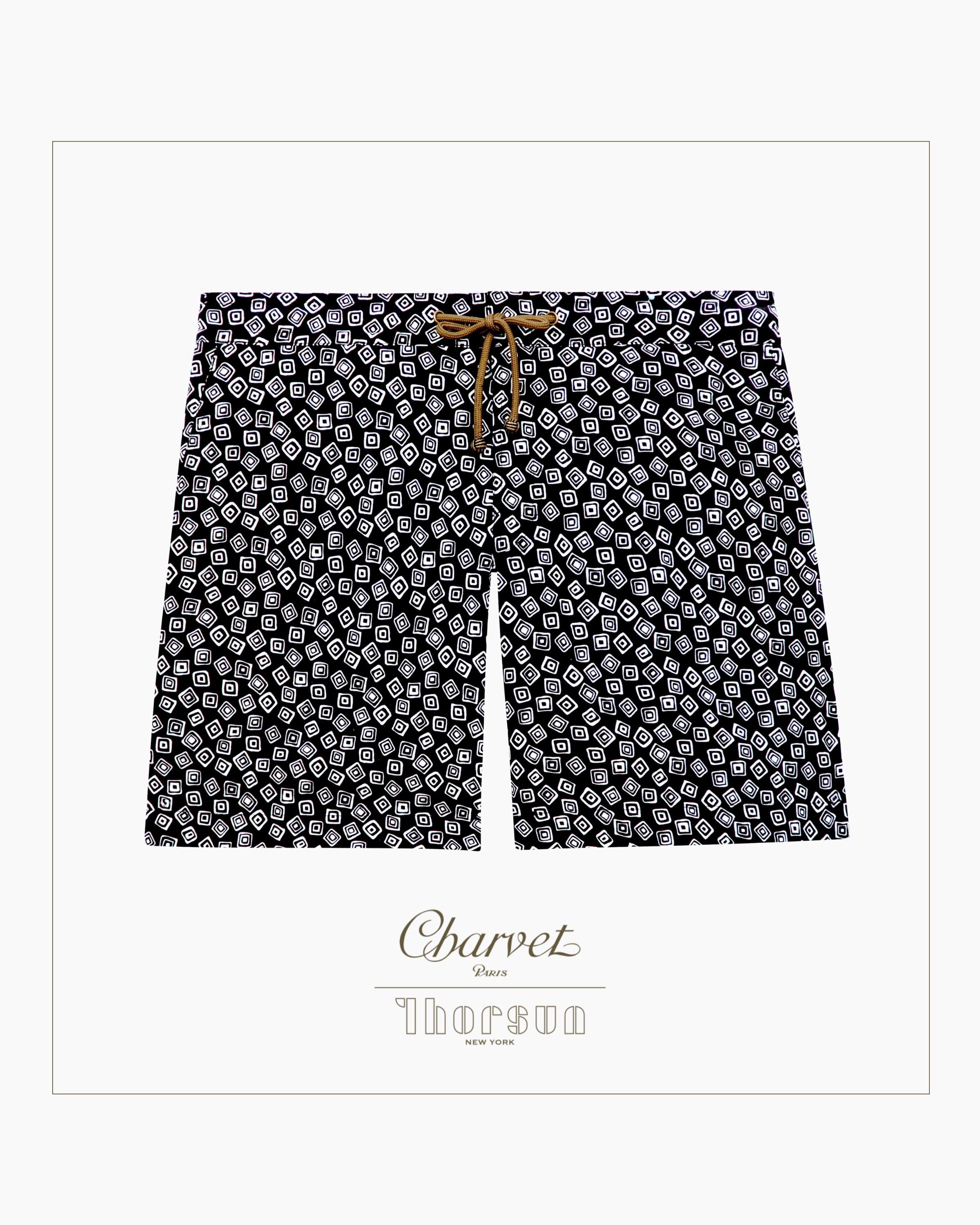 Charvet x Thorsun luxury men's swim shorts in black and white Floating Squares geometric print